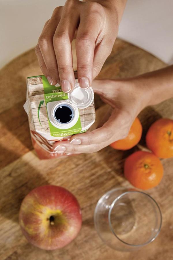 Capuchons attachés et couche barrière à base de fibres 